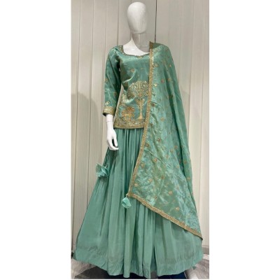 green lehenga with longer top delicate embroidery