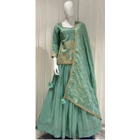 green lehenga with longer top delicate embroidery
